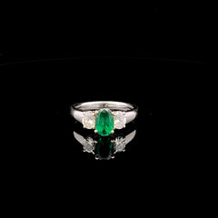 Three-Stone Emerald and Diamond Ring Three-Stone Emerald and Diamond Ring