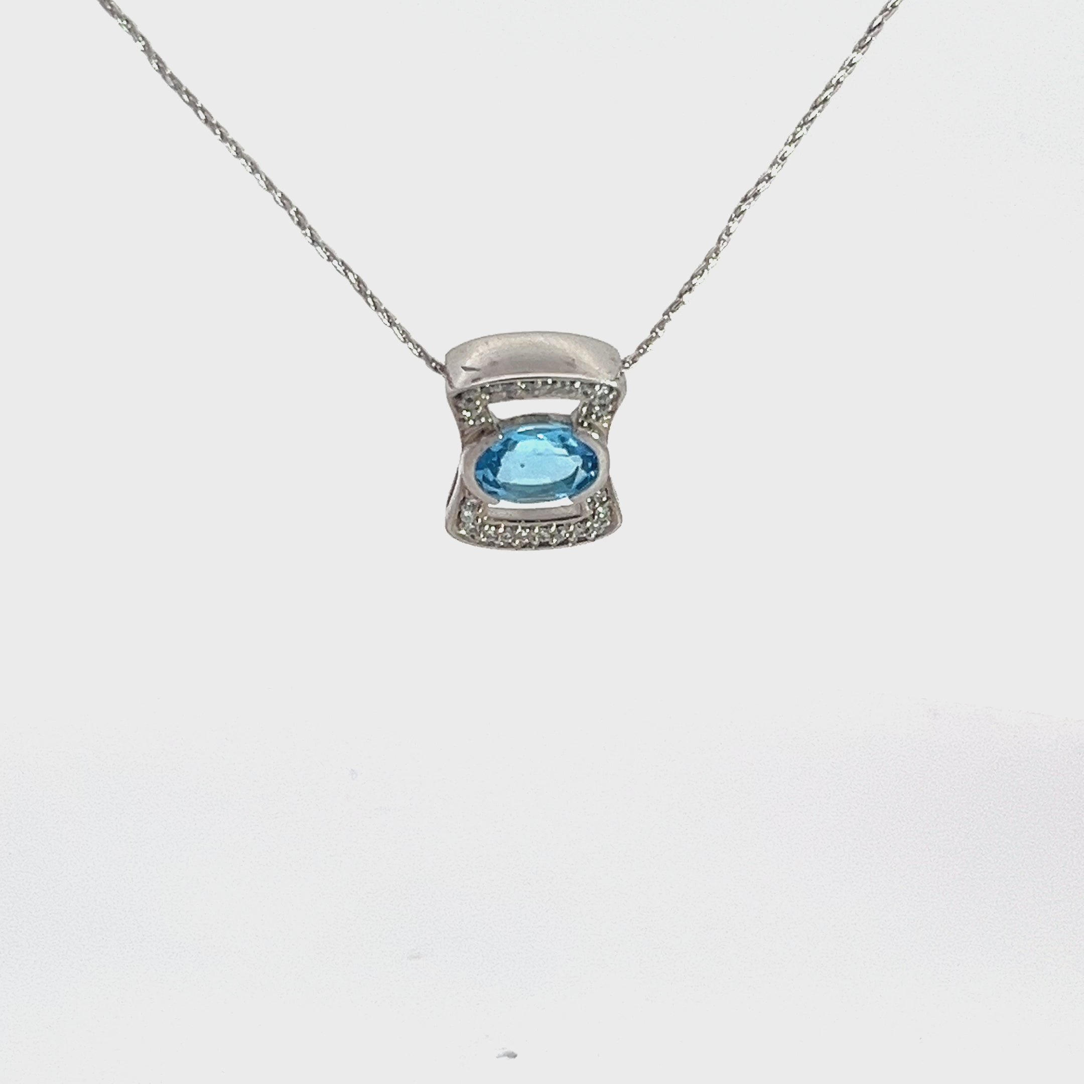 Blue Topaz and Diamond Pendant